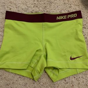 Green Nike Pros.